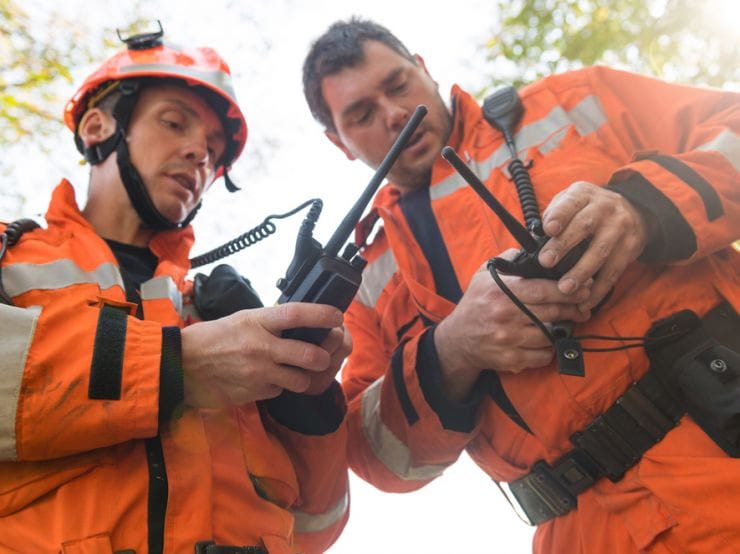 picture of fire fighters using walkie talkies